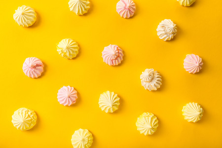 food background, dessert meringue on yellowの写真素材
