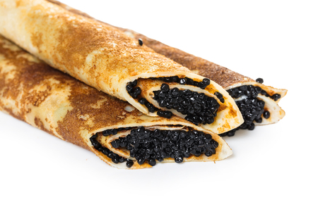 pancakes with black caviar on white backgroundの写真素材