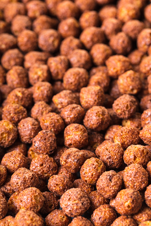 food background, texture of cereal balls with cocoa