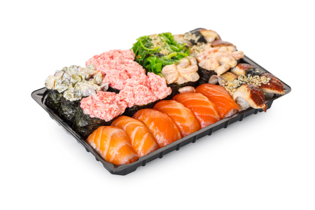 Japanese cuisine, sushi set in a package on a white isolated backgroundの写真素材
