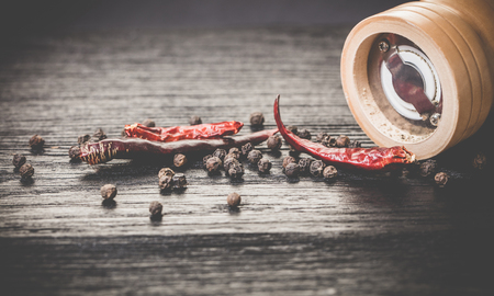 pepper with spices close-up on a black backgroundの写真素材