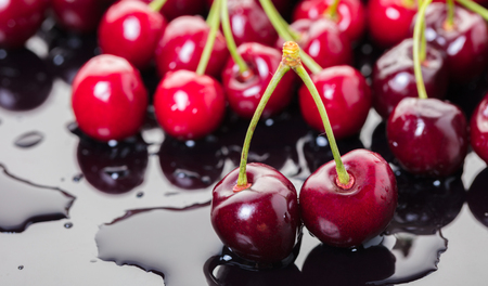 food background texture of fresh berries cherriesの写真素材