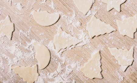 food background, raw christmas cookies closeup on table