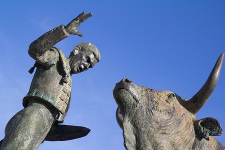 VIC-FEZENSAC, FRANCE, APRIL 3, 2011: Sculpture of a torero in front of his fight bull (details) on saturday, April 3, 2011, in Vic-Fezensac, Franceのeditorial素材