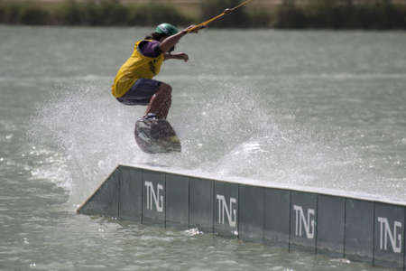 ISLE-JOURDAIN, FRANCE - MAY 27, 2011: Picture of a wakeboard competitor showing his skill at the International Wake'n Country on may 27, 2011, , Isle-Jourdain, France.のeditorial素材