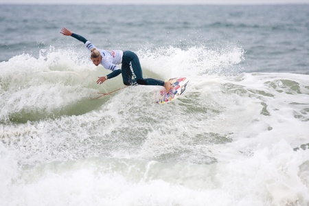 SEIGNOSSE, FRANCE - JUNE 2, 2011: American surfer Sage Erickson at the Swatch Pro France on June 2,...