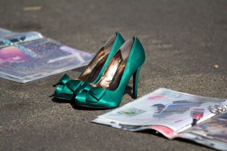 AURILLAC, FRANCE - AUGUST 22 : Green shoes in the street, Aurillac International Street Theater Festival, show by Ballets Temps Dance Jr Company, on august 22, 2012, in Aurillac,France. のeditorial素材