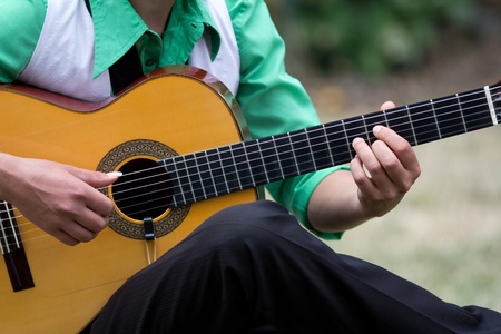 AURILLAC, FRANCE - AUGUST 23 : guitar player as part of the Aurillac International Street Theater Festival,show l'abeille bleue , on august 23, 2012, in Aurillac,France. のeditorial素材