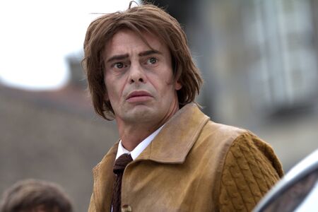 AURILLAC, FRANCE - AUGUST 24 : pensive actor in the street as part of the Aurillac International Street Theater Festival,show by the Company En Estafette , on august 24, 2012, in Aurillac,France. のeditorial素材