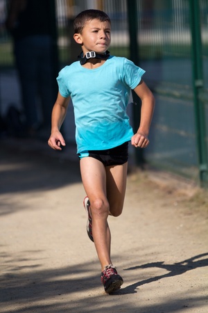 AUCH, FRANCE - SEPTEMBER 8: an unidentified young runner, Auch Triathlon, on September 8, 2012 in Auch, France.のeditorial素材