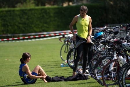AUCH, FRANCE - SEPTEMBER 8: Two unidentified triathletes in the transition area before the beginning of the swim race, Auch Triathlon, on September 8, 2012 in Auch, France.のeditorial素材