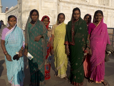 AGRA,  INDIA - MARCH 4: A group of kind Indian women is posing near The Taj Mahal, on March 4, 2013, Agra, India.のeditorial素材