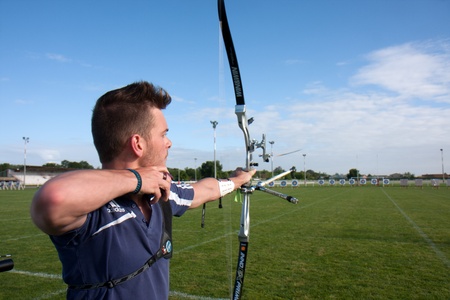 AUCH, FRANCE - MAY 11:  an unidentified competitor is shooting with a bow and an arrow, at the National tournament for young archers, on May 11, 2013, in Auch, France. のeditorial素材