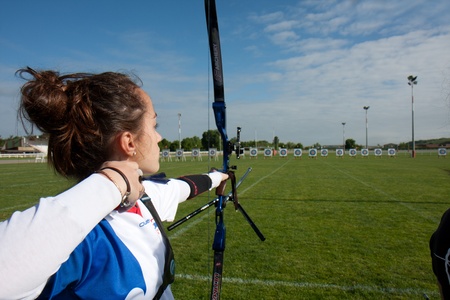 AUCH, FRANCE - MAY 11:  an unidentified female competitor at the National tournament for young archers, on May 11, 2013, in Auch, France. のeditorial素材