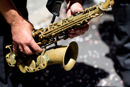 AURILLAC, FRANCE - AUGUST 21  Very close-up portrait of a saxophone player, as part of the Aurillac International Street Theater Festival, on august 21,2013, in Aurillac,France  のeditorial素材