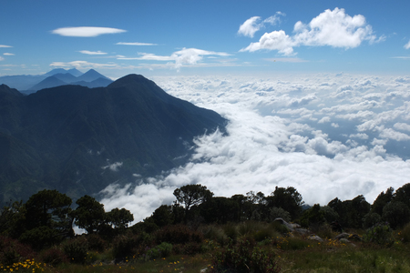 Sea of clouds from the summit of the Santa Maria volcano, Guatemala, Central America の写真素材