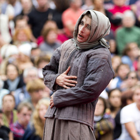 AURILLAC, FRANCE, AUGUST 22: Actress playing a starving Russian peasant as share of the Aurillac International Street Theater Festival, cie teatro del silencio, there august 22, 2014 in Aurillac, France.のeditorial素材