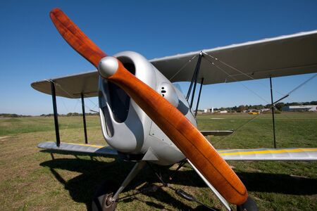 Beautiful wooden propeller on an old aircraft.