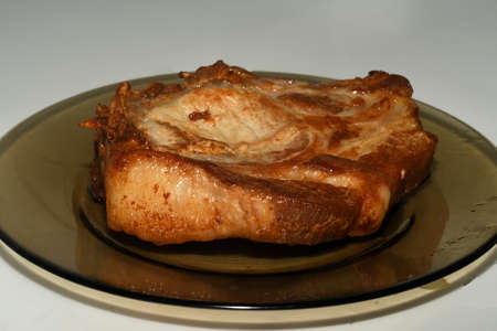 a piece of roast meat on a plateの写真素材