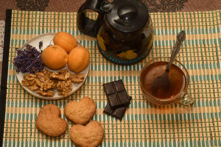 tea with sweets and fruitの写真素材