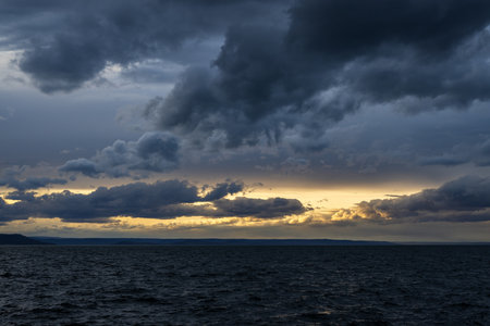 Stormy clouds over the sea at sunset. dramatic sky.