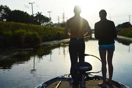 Couple Fishing on Boatの写真素材