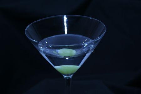 Glass of martiny with olive.の写真素材