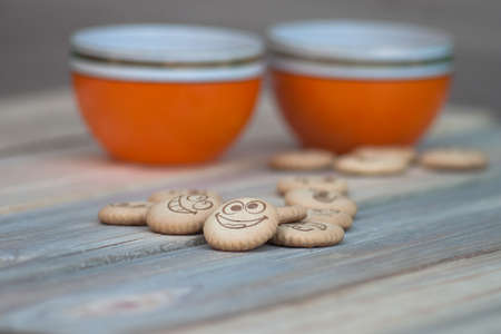 Cool cookies with smiles and tea. a little blur