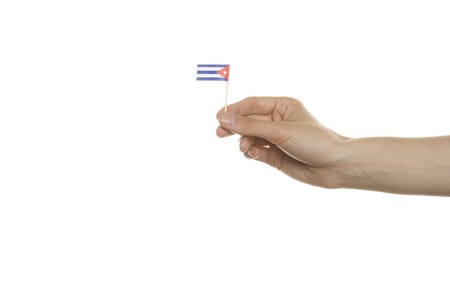 Small Cuba flag in his handの写真素材