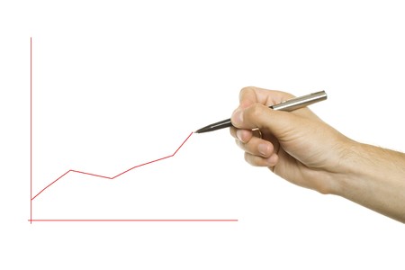 Hand showing income rateの写真素材