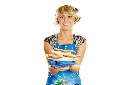 Young woman prepared cookies for Xmasの写真素材