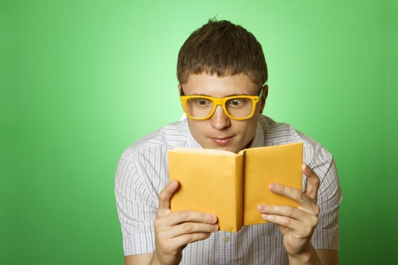 Young man bookworm reading 