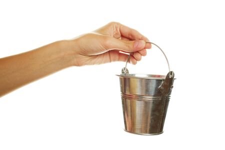 Hand holding a bucketの写真素材