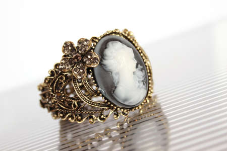 Bronze bracelet carved with the image of a girl silhouetteの写真素材