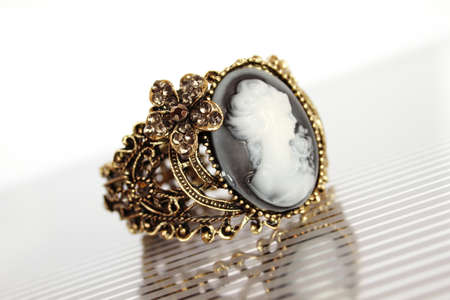 Bronze bracelet carved with the image of a girl silhouetteの写真素材