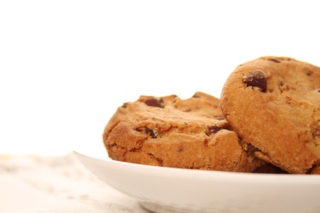 Close-up of round chocolate biscuits are on the plate