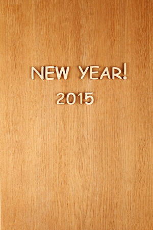 Closeup wooden text  New year 2015   Background