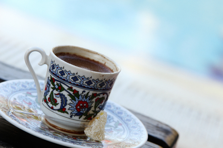Traditional Turkish coffee is hot around the pool.の写真素材