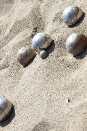 Balls for playing bocce on the sandの写真素材