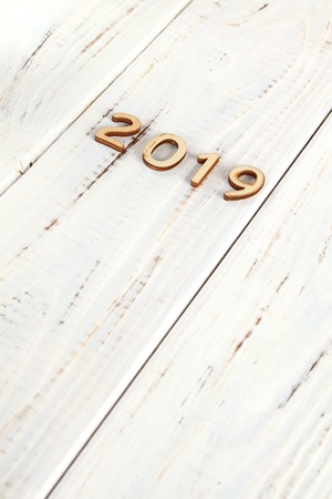 White wooden background with numbers 2019. Background for new yearの写真素材