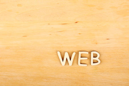 Wooden background with text web. Wallpaper Internetの写真素材