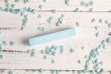 The month of February is written on a wooden bar. Background for the calendar.の写真素材