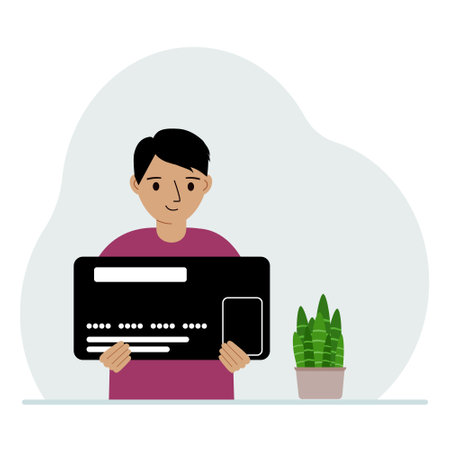A boy holds a large credit card in his hands. Vector flat illustrationのイラスト素材