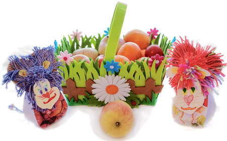 Flower homemade easter basket with fruit, apples and crafts from cardboard ideal toy lion Isolation on a white background nobodyの写真素材