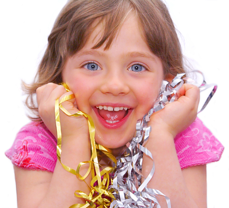 The little girl laughs so that visible teeth,  her hands kept packing tape for gifts. Hands pressed hard to face. Isolated on white.
の写真素材