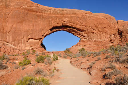 Evening Light on the North Window Arch in Arches National Parkの写真素材