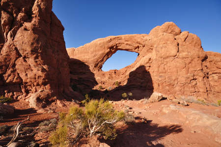 Evening Light on the South Window Arch in Arches National Parkの写真素材