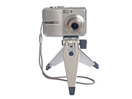 fotocamera on stand on white backgroundの写真素材