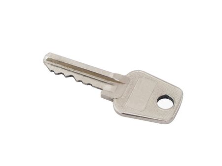 Silvery key on a white background on a white background close up is isolated       