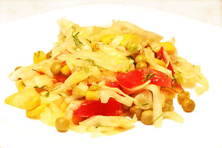 Dietary salad from fresh vegetables on a plateの写真素材